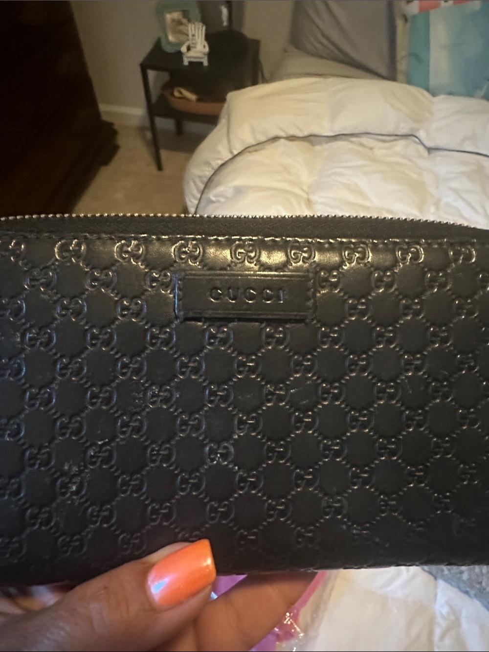 Gucci Black Embossed GG Zip-Around Wallet